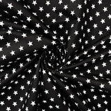 115CM PRINTED POLY COTTON WHITE STARS BLACK BACKGROUND