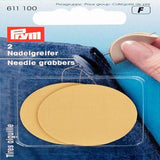 NEEDLE GRABBERS